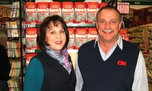 OK Foods Gansbaai se trotse eienaars, Petra en Chris van Rensburg.